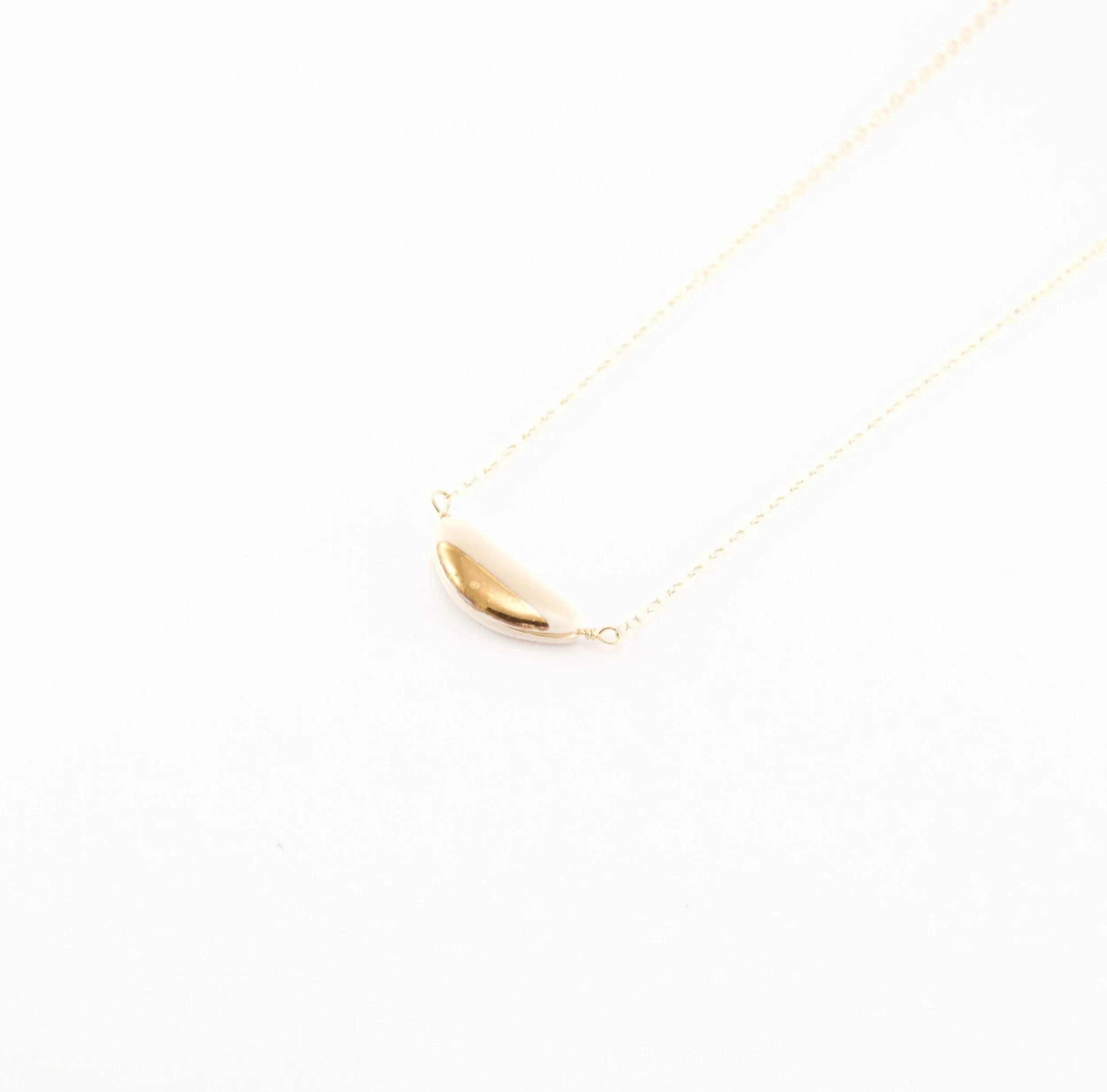 teeny half pebble necklace — ZOË COMINGS teeny half pebble necklace — ZOË COMINGS